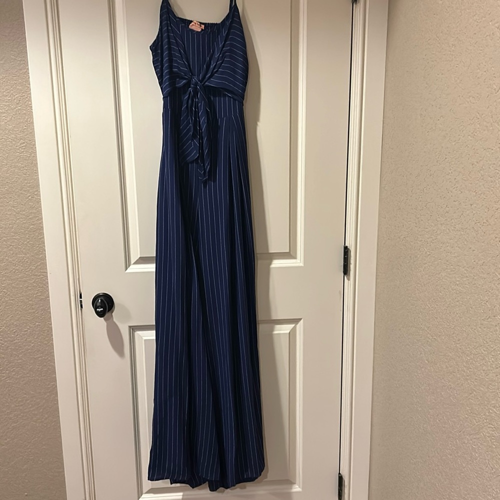 Navy jumpsuit with white stripes, tie-front, wide-leg,and a cut-out back